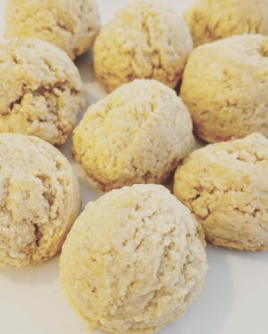 Melissa Rauch Instagram - I told myself I wasn't going to waste time taking multiple pics when taking a selfie for IG, so here you go....my first and only pic. Nailed it. Had a bunch of lemons from a tree in my yard so decided to make some LEMON COOKIES! 
Here's the recipe (they happen to be #GlutenFree and #Vegan (unless you decide to top them with spaghetti and meatballs in which case they would be #neither...your call)!
Ingredients:
2 cups almond flour 
1 cup oat flour 
1/4 cup coconut sugar
1 tsp baking powder
pinch of salt (if you have a big pincher take it easy)
Zest of two lemons
1/4 cup fresh lemon juice (May I recommend you use the juice from the lemons you zested so that you're not wasting lemons. Plus, I find the lemons look sad and angry after they've been zested, so I feel like juicing them afterward gives them a sense of purpose and makes them calm down)
1 tablespoon vanilla extract 
2 tablespoons maple syrup
1 tablespoon coconut oil (melted)
Mix dry ingredients, then when they get sick of each other and want to liven things up, add the wet ingredients. They'll welcome the change of texture. Am I aware that I keep anthropomorphizing food? Yes, and get off my junk before I send a zested lemon to teach you a lesson. Mix it all together until it forms a big ball of sticky dough. Put in the fridge for about an hour. Not going to tell you what to do with that hour other than preheat the oven at some point to 350 and spend some time thinking about how you judged me a couple sentences back. After an hour, use a cookie scoop or a tablespoon and place dough on a baking sheet. Bake for about 10-15-ish minutes. You're going to have to do you here because I forgot to time it exactly. Take them out and enjoy. Unless you don't enjoy lemon, in which case you will absolutely hate themm! *I realize I have an extra "m" in "them" - but I also told myself I won't waste time fixing typos, so it's staying as is.