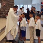 Metinee Kingpayome Instagram - First Communion 🙏 So proud of you #kayden #kingpayomefamily