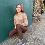 Mia Talerico Instagram - Currently obsessed with this bubble tee and leggings by @fivedancewear Use code MIA15 to save 15% They are so soft and comfortable for workouts and lounging 😊🤎 @five.the.label #smile