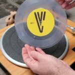 Michael Stevens Instagram - This is the vinyl we released 3 years ago to raise money for the Alzhiemer's Association. 500 lucky people got a copy. Let's listen to it! @jakechudnow #music #vinyl #jakechudnow #vsauce #vsaucemusic #recordplayer #vinylrecord #moonmen #Alzhiemers