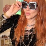 Michaela Jaé Rodriguez Instagram - It was all a euphoric, GLAM ROCK GLASTO dream with the one and only @CharlotteTilbury!!! 🎪✨💄🌈 I couldn’t have asked for better time at Glastonbury with Charlotte, the family and Sir @eltonjohn at Elton’s iconic headline @glastofest performance on Sunday night!! Makeup and skincare magic for a magically divine event by @SofiaTilbury wearing a starry Rock Chick eye and Lip Blur in NUDE BLUR on the lip – obsessed! Skin stayed fresh and glowing all day and night thanks to my festival skin MVPs: Magic Cream and the Magic Hydrator Mist! ⭐️💋🕺🏼