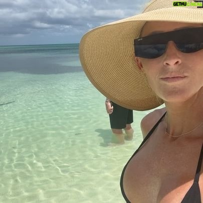 Michelle Leigh Calaway - 57.7K Likes - I was simply enjoying a book on the beach when this “vegetation” looked a lot like a shark…..so I text hubby @undertaker 🦈😳kinda digging that last picture …A LOT😍#myprotector 🖤