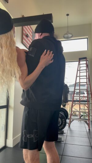 Michelle Leigh Calaway Instagram - Wanted to see if sweats would slip too bad, so asked hubs @undertaker to hold me for second! I caught a hammy cramp, he caught me & then I caught the bag!🤣🤣🤣