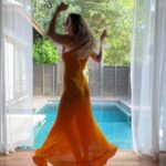 Michelle Monaghan Instagram - The thrill of it all. 🧡 (and for those of you commenting on the new hair - thx to the best of the best @traceycunningham1 and team, I’m loving my new blonde locks! 🤗 and of course donning my favorite new frock by @shopdoen. #happysaturday #lost #mood