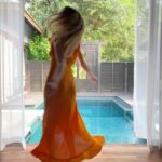 Michelle Monaghan Instagram - The thrill of it all. 🧡 (and for those of you commenting on the new hair - thx to the best of the best @traceycunningham1 and team, I’m loving my new blonde locks! 🤗 and of course donning my favorite new frock by @shopdoen. #happysaturday #lost #mood