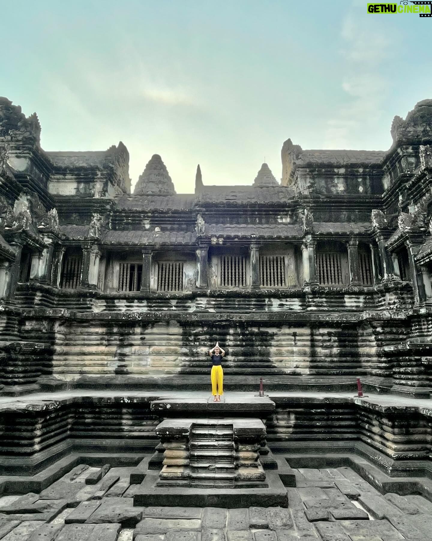 Michelle Monaghan Instagram - Lost in the magic of the ancient temples of Angkor Wat, aka “City of Temples”.✨This Eighth Wonder of the World is the largest religious monument in the world! Built 900 years ago, it holds the mythology of both Hindu and Buddhism religions. To experience its sheer beauty at sunrise was a dream come true. 💫Thank you to my incredible Cambodian tour guide “Lee” @chhvn1y_chhorn for the history lesson and for capturing our awe-inspiring day. I’ll treasure it forever. 🙏 #angkorwat #cambodia