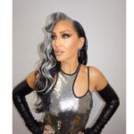 Michelle Visage Instagram - SHOOTING FROM THE HIP: Let’s get into the look of this episode! @dragraceukbbc tonight: THIS DRESS Vintage @muglerofficial designed by @davidkoma Hair @haircraigmarsden Paint @samglamuk Shoes @casadeiofficial White suit @riverisland Gold ombré glitter heels @dune_london Silver hoops @sheilafajl