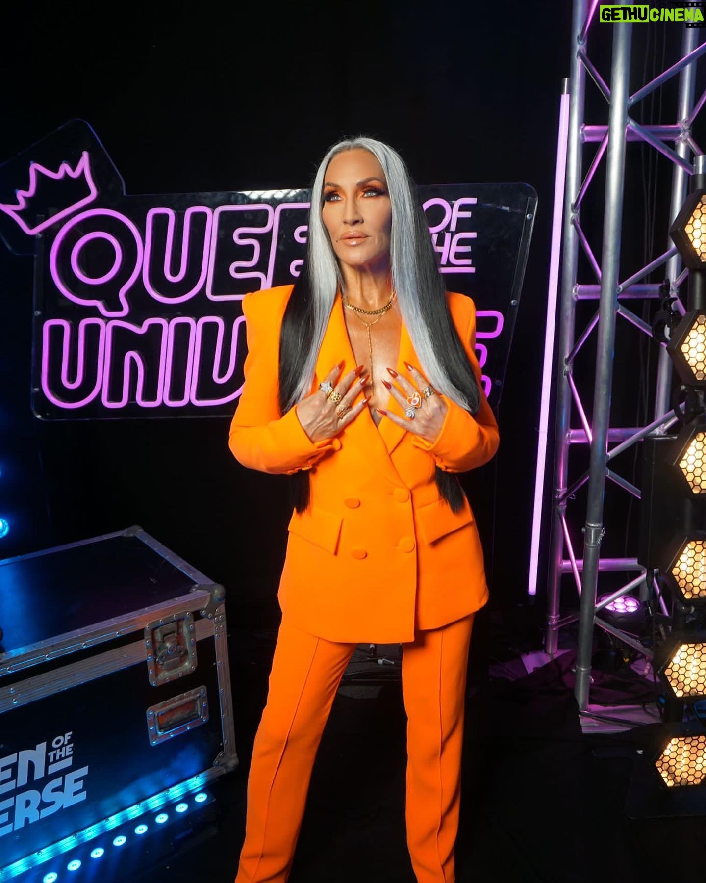 Michelle Visage Instagram - Two fabulous queens, one song! ππ Donβt miss an all-new #QueenOfTheUniverse NOW STREAMING on @paramountplus! β¨ Hair @haircraigmarsden Paint @samglamuk Style @laurysmith Suit @alexperryofficial Necklace @chlobojewellery Shoes @louboutinworld Glow @teresaboyd_tanning using @siennaxofficial
