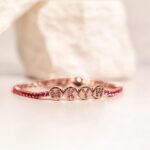 Michelle Wie Instagram - In honor of Mother’s Day this weekend @michellewiewest and @wove_made partnered to create a limited-edition version of the iconic TNT bracelet. The customizable tennis bracelet is now available in PINK SAPPHIRE - the perfect way to add a little color to your wrist stack 💖💞💓💗🌸💘🩷 Treat the ladies in your life to the same bracelet worn by THE Taylor Swift 👑 Shop it at the link in our bio 🔗