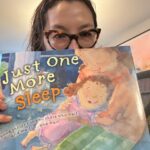 Michelle Yeoh Instagram - With my little baby doll and reading my favourite book 💖✨