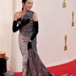 Michelle Yeoh Instagram – Thank you for my amazing team ✨❤️ 
Makeup: @sabrinabmakeup 
Hair: @robertvetica 
Styling: Johan, Chayma @balenciaga 
Dress / Shoes / Gloves: @balenciaga 
Watch: @richardmille 
Jewellery: @cindychao_theartjewel