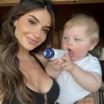 Mikaela Hoover Instagram - My 11 month old nephew is almost bigger than me & loves the taste of my lotion #stopgrowingsofastpleaseandthankyou