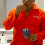 Mike Tyson Instagram - Savoring Mike’s “Night Bites”👂💤 The only time you’d let @miketyson knock you out! 🥊