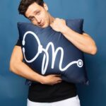 Mikhail Varshavski Instagram - New Limited Time Merch 👉🏼 LIVE! We got pillows, blankets, peewoops, even a baby onesie! By far my most fun collection, let me know which design is your favorite ❤️ #linkinbio #peewoop