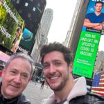 Mikhail Varshavski Instagram - An incredible moment to share with my father in #timessquare being able to support science 🙏🏼❤️ We walked through Times Square 20 years ago during our first days as immigrants and now we both proudly walk as licensed doctors and I owe all of that to him! @covidvxproject #ᴠaccinessavelives #happybdaypappa