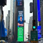 Mikhail Varshavski Instagram - An incredible moment to share with my father in #timessquare being able to support science 🙏🏼❤️ We walked through Times Square 20 years ago during our first days as immigrants and now we both proudly walk as licensed doctors and I owe all of that to him! @covidvxproject #ᴠaccinessavelives #happybdaypappa