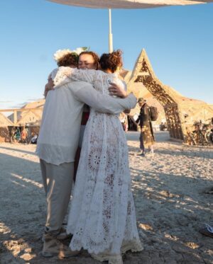 Milana Vayntrub Instagram - Married my husband in front of the temple he built. 
Our impromptu rabbi @elienblue had us exchange pink sunglasses under a chuppah held by irl spirit guide @michaelawat and lifelong friend @alina.greenbergla and their perfect partners. 

Thank you to the ladies at @zimmermann for helping me find a dress that was miraculously an extension of the temple. And thank you to @alicyn for the crown! 

Photos by the trusty, dusty and talented @svetolov. 

Special shout-out to @ajsalty who we couldn’t and wouldn’t have done it without. Love you. Thank you.