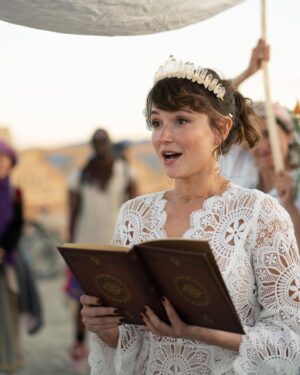 Milana Vayntrub Instagram - Married my husband in front of the temple he built. 
Our impromptu rabbi @elienblue had us exchange pink sunglasses under a chuppah held by irl spirit guide @michaelawat and lifelong friend @alina.greenbergla and their perfect partners. 

Thank you to the ladies at @zimmermann for helping me find a dress that was miraculously an extension of the temple. And thank you to @alicyn for the crown! 

Photos by the trusty, dusty and talented @svetolov. 

Special shout-out to @ajsalty who we couldn’t and wouldn’t have done it without. Love you. Thank you.