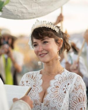 Milana Vayntrub Instagram - Married my husband in front of the temple he built. 
Our impromptu rabbi @elienblue had us exchange pink sunglasses under a chuppah held by irl spirit guide @michaelawat and lifelong friend @alina.greenbergla and their perfect partners. 

Thank you to the ladies at @zimmermann for helping me find a dress that was miraculously an extension of the temple. And thank you to @alicyn for the crown! 

Photos by the trusty, dusty and talented @svetolov. 

Special shout-out to @ajsalty who we couldn’t and wouldn’t have done it without. Love you. Thank you.