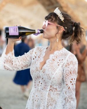 Milana Vayntrub Instagram - Married my husband in front of the temple he built. 
Our impromptu rabbi @elienblue had us exchange pink sunglasses under a chuppah held by irl spirit guide @michaelawat and lifelong friend @alina.greenbergla and their perfect partners. 

Thank you to the ladies at @zimmermann for helping me find a dress that was miraculously an extension of the temple. And thank you to @alicyn for the crown! 

Photos by the trusty, dusty and talented @svetolov. 

Special shout-out to @ajsalty who we couldn’t and wouldn’t have done it without. Love you. Thank you.