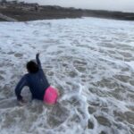 Millie Court Instagram – Family day out down the beach… these mad welshies made me run into the sea 😳🤣🌊