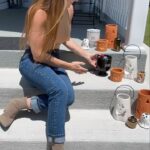 Mina Starsiak-Hawk Instagram - We know the weather is still warm… but October means it’s time to start prepping for Halloween! Make sure your porch is ready with adorable festive pots that double as candy bowls, Jack-O-Lantern Luminaries, or fan-favorite ghost vases! How are you getting ready for Halloween? Share in the comments! . . . #halloween #halloweencountdown #halloweenspirit #spookyseason #halloweendecor #spooky #spookymonth #spookyvibes #halloweeniscoming #halloweenedit #halloweenhome