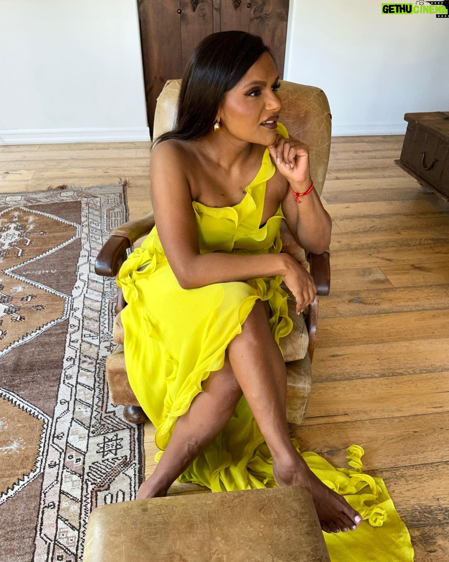 Mindy Kaling Instagram - Probably my favorite dress and even a little bare foot for the friendly perves 💕