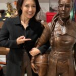 Ming-Na Wen Instagram - Like my twin?😂😂 Okay. Why do I have a LIFE-SIZE bronze statue of me as Fennec Shand? Well, my amazing husband started the process last April of having one made to celebrate my birthday. It was carved from clay from just a photo as reference. The artistry and accuracy is remarkable. Several revisions took place. (Thank you, @mitchelwuphotography & @jenchiwu for your input.🥰) This was all done in secrecy. Unfortunately, it didn't arrive in time for my birthday last November. It just arrived last week. When we had a couples night with some of our dearest friends we've known for over 20 years, Eric unveiled it. What a tremendous surprise! We were all in awe! He knows how much #starwars means to me; how being Fennec has been a childhood's dream come true for me. So he wanted to celebrate my birthday with something unique and BIG! He succeeded!! At first, I was utterly astounded and amused. I also thought he was crazy! Where the hell were we going to put it? She couldn't be outside scaring people! Once we moved her inside, she actually fits great in our media room. She's home! I love bronzed Fennec more and more, just like my love for this marvelous man. She's a daily reminder of how lucky I am to have such a thoughtful and loving husband. He's the best! Thank you, babe! I love you, always. ❤️🥰 #thisistheway #fennecshand #themandalorian #thebookofbobafett #starwars