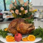 Ming-Na Wen Instagram - Happy Thanksgiving, everyone! 🍁🍂🦃🧡 So many blessings to be grateful for in my life. I always love creating the table setting for our family and friends to gather and feast together. But this Thanksgiving, I had an extra challenge. A leak required demoing a beam in the dining area. TOTAL EYESORE! It needed some temporary camouflage. Mingyver to the rescue! I made an "art piece" with some colored tissue paper and tape. Certainly better than that ugly exposed beam and insulation! I call the art installation, "BLOSSOM OF BLESSINGS." You like? ☺️🥰🧡 #dinnerfor20 #Thanksgiving #feast #grateful Also, hubby made the most delish air-fried turkey. Juicy and tender. YUM!