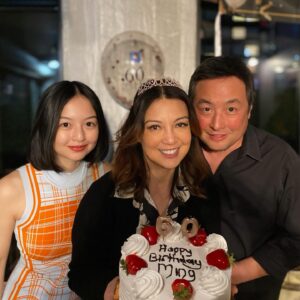 Ming-Na Wen Instagram - ForPart 2, Eric also threw me a beautiful party in New York City. I was in NYC to hang with Michaela and he flew out and surprised me.

He went through all the trouble to book a great hotel space with outdoor patios overlooking Manhattan and gathered so many friends and family! I was surprised to see some dear friends who came in from out of town and ones I hadn't seen in awhile. 🥰❤️

And TECHNICALLY, he did keep his promise. 

TODAY is my real birthday, and we are just having a nice quiet day at home. No parties...
I HOPE! 🙏🏼

Thank you to everyone who came out and I love all my fans who have been wishing me a happy birthday! So many blessings!! Thank you! And biggest thank you to my beloved and amazing husband. Love you forever, Eric. May we share decades more of bdays together. 🙏🏼❤️🥰🎂🎁🎊