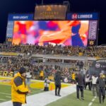 Ming-Na Wen Instagram - Look, mom, I'm on the jumbotron!! What a rush! 🖤💛 #terribletowel #toweltwirl #terribletwirl @themandalorian @thebookofbobafett