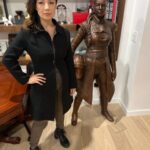 Ming-Na Wen Instagram - Like my twin?😂😂 Okay. Why do I have a LIFE-SIZE bronze statue of me as Fennec Shand? Well, my amazing husband started the process last April of having one made to celebrate my birthday. It was carved from clay from just a photo as reference. The artistry and accuracy is remarkable. Several revisions took place. (Thank you, @mitchelwuphotography & @jenchiwu for your input.🥰) This was all done in secrecy. Unfortunately, it didn't arrive in time for my birthday last November. It just arrived last week. When we had a couples night with some of our dearest friends we've known for over 20 years, Eric unveiled it. What a tremendous surprise! We were all in awe! He knows how much #starwars means to me; how being Fennec has been a childhood's dream come true for me. So he wanted to celebrate my birthday with something unique and BIG! He succeeded!! At first, I was utterly astounded and amused. I also thought he was crazy! Where the hell were we going to put it? She couldn't be outside scaring people! Once we moved her inside, she actually fits great in our media room. She's home! I love bronzed Fennec more and more, just like my love for this marvelous man. She's a daily reminder of how lucky I am to have such a thoughtful and loving husband. He's the best! Thank you, babe! I love you, always. ❤️🥰 #thisistheway #fennecshand #themandalorian #thebookofbobafett #starwars