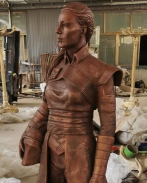 Ming-Na Wen Instagram - Like my twin?😂😂

Okay. Why do I have a LIFE-SIZE bronze statue of me as Fennec Shand? 

Well, my amazing husband started the process last April of having one made to celebrate my birthday.  It was carved from clay from just a photo as reference. The artistry and accuracy is remarkable. Several revisions took place. (Thank you, @mitchelwuphotography & @jenchiwu for your input.🥰) This was all done in secrecy. 

Unfortunately, it didn't arrive in time for my birthday last November. It just arrived last week. When we had a couples night with some of our dearest friends we've known for over 20 years, Eric unveiled it. What a tremendous surprise! We were all in awe!

He knows how much #starwars means to me; how being Fennec has been a childhood's dream come true for me. So he wanted to celebrate my birthday with something unique and BIG! He succeeded!!

At first, I was utterly astounded and amused. I also thought he was crazy! Where the hell were we going to put it? She couldn't be outside scaring people!

Once we moved her inside,  she actually fits great in our media room. She's home!
I love bronzed Fennec more and more, just like my love for this marvelous man. She's a daily reminder of how lucky I am to have such a thoughtful and loving husband. He's the best!  Thank you, babe! I love you, always. 
❤️🥰
#thisistheway #fennecshand #themandalorian #thebookofbobafett #starwars
