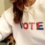 Minka Kelly Instagram - Spread the word and make your voice heard! My friends @shoprhode made this cozy VOTE Sweatshirt which is locally crafted in Los Angeles and ⁣100% of profits will be going toward civic engagement and voter education campaigns.⁣ ⁣Freddy approves. #VOTE⁣ #ontheRHODE⁣