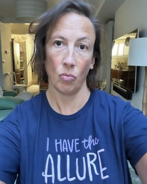 Miranda Hart Instagram - Sometimes, when my life and job involves posing in a t-shirt that states my ‘allure’ because it’s part of a comedy creation thingy I do, that can jar when you hold acute awareness of suffering in the same world. 
But I decided that the worst thing we can do is stop doing the things we do. Because not everyone can be on the frontline and we all have skills that the world needs and I suppose sometimes we just have to think about making our little patch of the world a fraction better for whatever silly or seemingly meaningless way. 
So here is me, my allure and my t-shirt from @themirandashop where I create some fun and cosy things that may help one or ten of you feel better. And remember you too have the allure!!! 🧡🧡