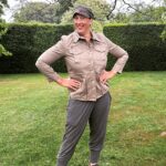 Miranda Hart Instagram – She’s smiling in the rain. 
She’s talking about herself in the third person. 
She’s wearing a new jacket that makes her feel like a cross between a gardener, a landgirl and Indiana Jones. 
 Important details of why I share here:-

British outerwear brand @TROYLondonUK has teamed up with @CountrysideFund by releasing a selection of their best-selling Tracker Jackets individually embroidered with The Prince’s Countryside Fund logo and donating £50 from each sale to the charity through the summer. These 100% cotton jackets are a great summer layer for those looking to support the vital work of the PCF to support farming businesses, rural enterprises, and provide training opportunities for young people.