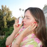 Miranda Kerr Instagram – It’s finally here!!! After 5 years of testing and perfecting our formula, I am sooo excited to introduce @koraorganics NEW Silky Sun Drops ✨☀️💛 This SPF 30 sunscreen serum not only protects from harmful rays, but also primes the skin, reduces redness and gives a silky smooth finish with no white cast. I am obsessed and I can’t believe I finally get to share it with all of you! Available now on koraorganics.com   dropping in @sephora US on 5/13