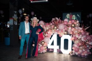 Miranda Lambert Instagram - 3 weeks ago today. My Billy Bob’s Texas  boot scootin’ 40th💕. The absolute best  birthday my Texas heart could ask for. Thanks @cameronruthm for putting it all together and for the  prettiest balloon arches I’ve ever seen. And huge thanks to my pals and hero’s  @adamhoodmusic @randyrogersband @wadebowen for over 20 years of friendship and for entertaining us all night. Thanks to my city mouse friend @telemitry for going country , for the late night jams, and even wearing fringe🤠. Thank you @tylerjconrad for capturing all the fun. 

I got to enter a new decade with dear friends and  family at my favorite honky tonk @billybobstexas . There are so many pics full of  joy and smile’s so I’m gonna keep on posting’! That’s why it has  taken me 3 weeks to post these. I’ve just been overwhelmed with gratitude and love for everyone that came to scoot your boots with me. I love all of y’all so so so much❤️🤠cheers to 40!

📸: @tylerjconrad