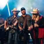 Miranda Lambert Instagram - 3 weeks ago today. My Billy Bob’s Texas boot scootin’ 40th💕. The absolute best birthday my Texas heart could ask for. Thanks @cameronruthm for putting it all together and for the prettiest balloon arches I’ve ever seen. And huge thanks to my pals and hero’s @adamhoodmusic @randyrogersband @wadebowen for over 20 years of friendship and for entertaining us all night. Thanks to my city mouse friend @telemitry for going country , for the late night jams, and even wearing fringe🤠. Thank you @tylerjconrad for capturing all the fun. I got to enter a new decade with dear friends and family at my favorite honky tonk @billybobstexas . There are so many pics full of joy and smile’s so I’m gonna keep on posting’! That’s why it has taken me 3 weeks to post these. I’ve just been overwhelmed with gratitude and love for everyone that came to scoot your boots with me. I love all of y’all so so so much❤️🤠cheers to 40! 📸: @tylerjconrad Billy Bob's Texas