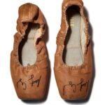 Misty Copeland Instagram - What an honor to have my pancaked pointe shoes in the @smithsonian 🩰 Did you know Black and Brown dancers will pancake their shoes (usually with over the counter foundation) to match their skin color? It’s customary in ballet to create a long line from your leg to your shoe, however the traditional “European pink” shoes aren’t the right color for many Black and Brown ballerinas. Only recently have companies begun to provide colors of all shades but there is always room for more inclusivity! Sign my petition at the link in bio for Apple to provide more shades of the pointe shoe emoji 🩰
