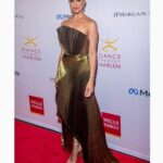 Misty Copeland Instagram - #Repost @semsem ・・・ Golden Goddess: Misty Copeland enchants the Dance Theatre of Harlem Vision Gala in our breathtaking gold metallic pleated dress, a testament to her unparalleled poise and beauty. @victorhenao @edrisjustedris @dancetheatreofharlem @kahlihaslam