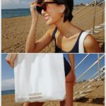Molly Chiang Instagram - This LV beach ensemble captures my carefree, sun-kissed spirit amidst Barcelona‘s vibrant coastal allure. 🏖️🧡💙@#LVCRUISE25 @louisvuitton - 這趟的LV托特包 墨鏡禮物 立刻把它們帶來巴塞隆納海灘拍美照😆 搭配我在Capri購入的LV泳裝 是不是有點配！！！😝 海灘Look就完成🫶🏾 昨天起了個大早 跟麥力兩個人殺到巴塞隆納海邊拍這組照片 這個海灘是《Somorrostro beach》✨ 剛好離這次住的飯店只要大概10分鐘距離 然後我們大概也只花了10分鐘拍完這組（？）😂 你們不覺得巴塞隆納海灘拍起來就是有種熱情奔放感嗎？還是我心理作用？🤣 目前在巴塞隆納兩天了 感覺這座城市藝術跟生活完美交織 覺得巴塞隆納各處都充滿了令人激動的創意火花 這裡流淌著一股摩登又迷人的氣息 同時又保留著古老的文化遺產 在海邊也能感受到這座城市浪漫奔放自由的氛圍 才來兩天已有點愛上這裡🥹 這座城市讓我心情好到大概就是像第二則影片一樣☺️❤️