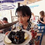 Molly Chiang Instagram - Back to my favorite place with @mytheresa.com x @dolcegabbana ❤️🍋 #Mytheresa #DolceGabbana #DGxMytheresa - 來你們自己說… 我是不是真的在義大利絲毫沒有違和感？🤣😂 我是不是真的有點適合這個畫面？？？😂 真的是我最喜歡的南義🥹 拍起來還是跟記憶中的一樣美！！！ 這次來Capri參加 @mytheresa.com & @dolcegabbana 發佈會活動 這篇的兩套衣服都是這一季新款 來南義真的就是要穿他們的衣服😜 就是這裡的衣服啊！！！ 為這裡而生的設計🥰 洋裝跟褲裝 這兩套你們喜歡哪一套？ 請投票！！！ 今天會陸續分享昨天活動的影片跟照片 可以來看我的裝扮有多Ready 🧏🏻‍♀️🤪❤️ P.S. 最後一張對比圖 明明在同個地方同台車 卻大不同 多不想曬太陽？以及多享受太陽？