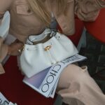 Nadine Leopold Instagram - My birthstone is a coffee bean 😋 Newsstand Pop Up by @jimmychoo 🗞️☕️