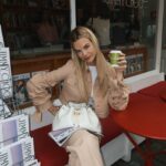 Nadine Leopold Instagram - My birthstone is a coffee bean 😋 Newsstand Pop Up by @jimmychoo 🗞️☕️