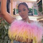 Nafessa Williams Instagram – Happy Sunday yall! I’m outside feeling cute. Yall feeling my feather top?! 🫶🏾💕 #fashion #feathers #sunday #explore #foryou