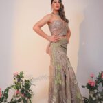 Nargis Fakhri Instagram – Bridal Shoot 
👗 💗 

Magazine:  @weddingvows.in 
Muse: @nargisfakhri
Founder & CEO: @itsme_daksh 

Photography @ishanzaka
Fashion Editor / Stylist: @sshorewala
Words: @farvi_wadhwa
MUA: @shefali_hairstylist.81 
Hair: @makeup.yasmin 

Video: @anuragkanoje18 @navi.nphotography
Production: @ssfashionstudiobyshrreeya 
Assistant Stylist: @hopeandfaith_arts
Decor: @discoveryevents @yashgandhi94

Location: @pixyl_media
Nargis manager @mahakbrahmawar 
Artist Reputation Management: @media.raindrop
For Wedding Vows: @farvi_wadhwa

 Mint green sharara
Outfit  @kashmira9
Jewels @jiadiamonds
Bag @linoperros
Shoes @theamyrastore

 Pastel Saree with corset blouse
Outfit @mymoledro
Jewels @jawahriiofficial
Shoes @linoperros