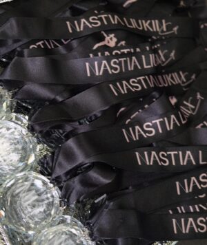 Nastia Liukin Instagram - Had you told me 15 years ago the Nastia Liukin Cup would not only still be happening but also:

-would become an event that coaches, staff   athletes would tell me it was more important to them to qualify to than their own national championships 
-would turn on the tv one day and see an NCAA gymnastics competition on ESPN with the gymnasts name, age, hometown, along with “NASTIA CUP QUALIFIER” in bold letters
-would take place in venues across the country in some of the most iconic arenas in the world — hi @thegarden   @attstadium 

Hand on my heart, I really don’t think I would have believed any of these things. Yet this weekend I found myself in the midst of what I thought was, THE most special year, event, and group of all 15. While sharing so much of this event over the years has become something I truly enjoy doing, this year I became a bit overwhelmed with trying to capture all the content and decided I wanted to truly be a little more present - less focused on getting it all captured. 

Bc be told - this was ALWAYS for   about those girls on the floor. And not just the moments on the floor, but even more so the moments out of the arena. The moments that aren’t ever broadcasted. The moments that are not possible to capture even if you tried. The moments we get to share together that make this entire thing SPECIAL.

And that’s exactly what I did. As I gathered the girls one final time after the competition, I thanked them (and much more)— for the first time I got emotional thinking how special this all was. Before the competition I asked them to try to find a moment that day   pause for a brief moment and be proud - of themselves for qualifying to what has become the most difficult JO competition to qualify to in USA. I continued to tell them that sure we all want to win- but results here wouldn’t matter as much as the journey   experience would. Bc this was never about the final standings, the city and venue, or the design of the leotards that year. 

Whether that was in arena or not and seen on social media or not - that was always my hope, dream and goal: creating a special experience - and making them all feel as special as they truly are. Xo NL 🩷