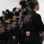 Nastia Liukin Instagram - Had you told me 15 years ago the Nastia Liukin Cup would not only still be happening but also: -would become an event that coaches, staff athletes would tell me it was more important to them to qualify to than their own national championships  -would turn on the tv one day and see an NCAA gymnastics competition on ESPN with the gymnasts name, age, hometown, along with “NASTIA CUP QUALIFIER” in bold letters -would take place in venues across the country in some of the most iconic arenas in the world — hi @thegarden @attstadium Hand on my heart, I really don’t think I would have believed any of these things. Yet this weekend I found myself in the midst of what I thought was, THE most special year, event, and group of all 15. While sharing so much of this event over the years has become something I truly enjoy doing, this year I became a bit overwhelmed with trying to capture all the content and decided I wanted to truly be a little more present - less focused on getting it all captured.  Bc be told - this was ALWAYS for about those girls on the floor. And not just the moments on the floor, but even more so the moments out of the arena. The moments that aren’t ever broadcasted. The moments that are not possible to capture even if you tried. The moments we get to share together that make this entire thing SPECIAL. And that’s exactly what I did. As I gathered the girls one final time after the competition, I thanked them (and much more)— for the first time I got emotional thinking how special this all was. Before the competition I asked them to try to find a moment that day pause for a brief moment and be proud - of themselves for qualifying to what has become the most difficult JO competition to qualify to in USA. I continued to tell them that sure we all want to win- but results here wouldn’t matter as much as the journey experience would. Bc this was never about the final standings, the city and venue, or the design of the leotards that year.  Whether that was in arena or not and seen on social media or not - that was always my hope, dream and goal: creating a special experience - and making them all feel as special as they truly are. Xo NL 🩷