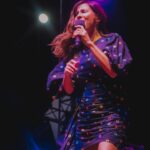 Natalie Imbruglia Instagram - “Oh what a night🎶”… Thank you Launceston! Such a warm crowd in Tasmania last night AND I had a much needed catch up with my sister @lauraimbruglia too! A fun night of Karaoke at The Irish was had by all!! First 3 pics by @elfie_germein 💜 The rest by @karenrossiter Styling @fredericalovellpank @thecorrsofficial TOUR OZ/NZ 💜🎶 @thetonichilds 🦄 @germeinsisters 🦋